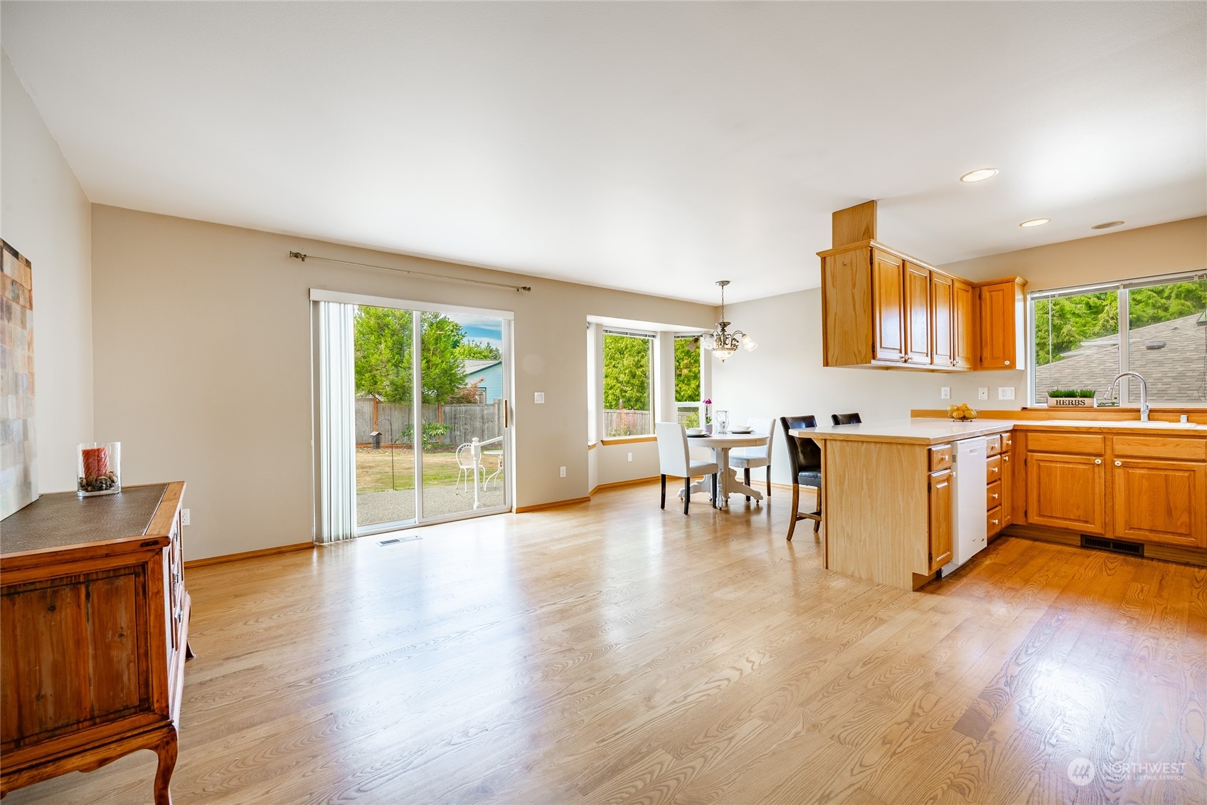 8087 Kispiox Road Blaine, WA 98230 - Photo 19 of 37 a view of kitchen with furniture and wooden floor