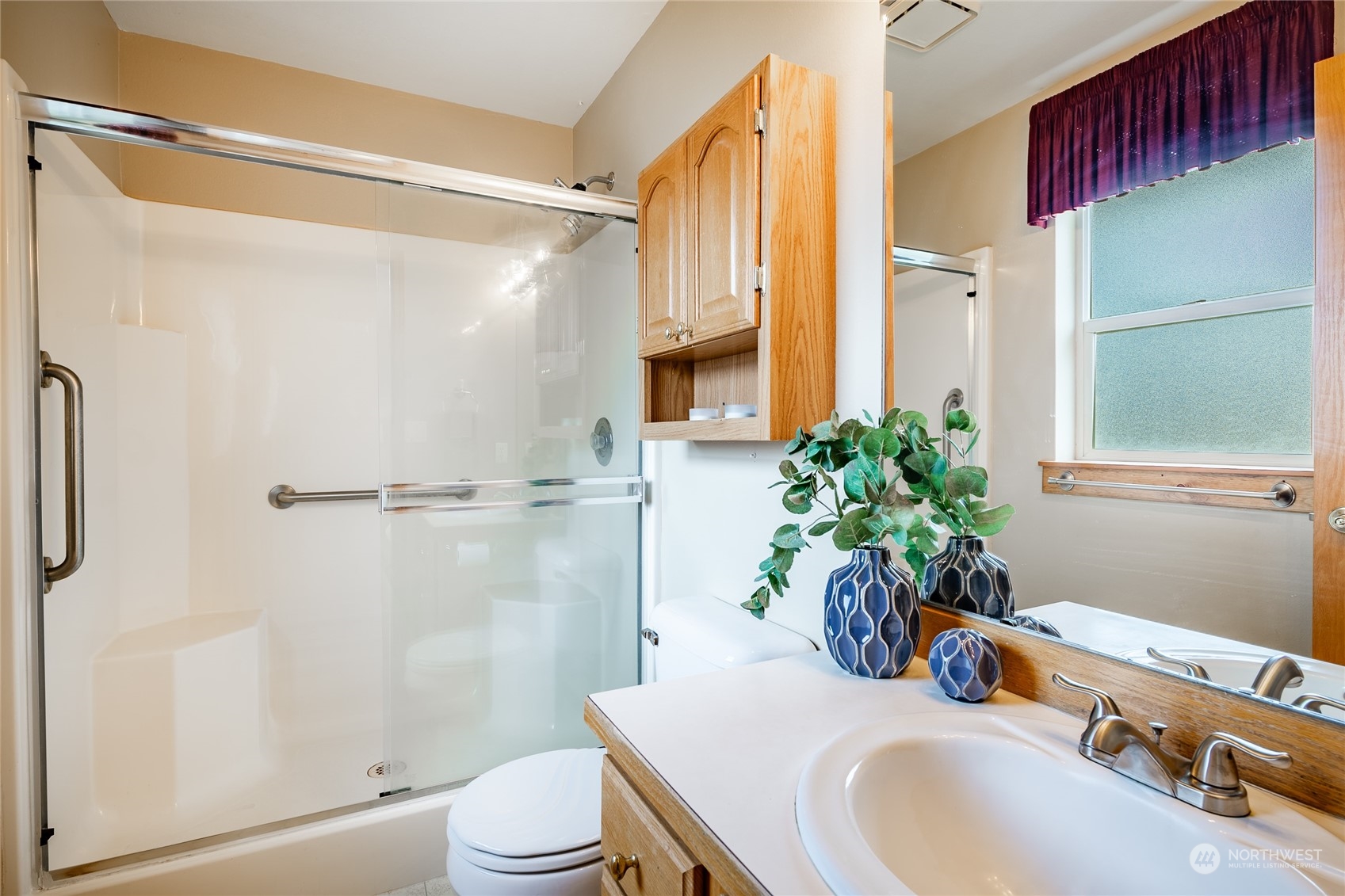 8087 Kispiox Road Blaine, WA 98230 - Photo 23 of 37 a bathroom with a sink toilet and shower