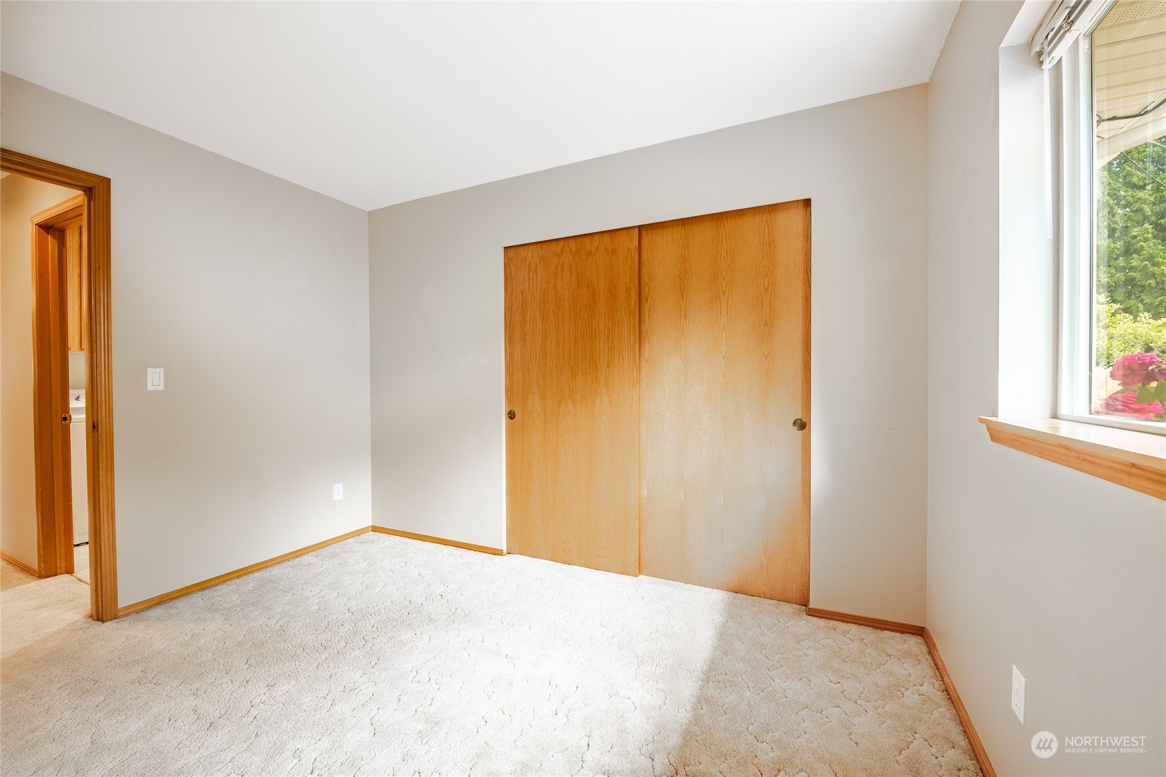 8087 Kispiox Road Blaine, WA 98230 - Photo 26 of 37 a view of an empty room with a window