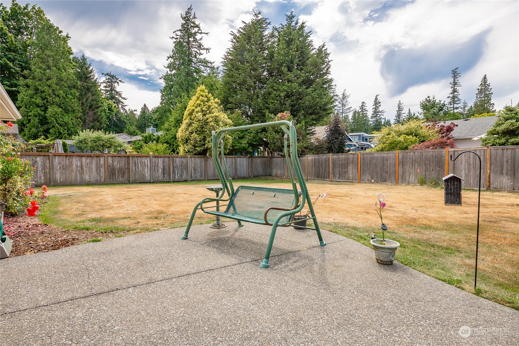 8087 Kispiox Road Blaine, WA 98230 - Photo 29 of 37 a swimming pool with outdoor seating and yard
