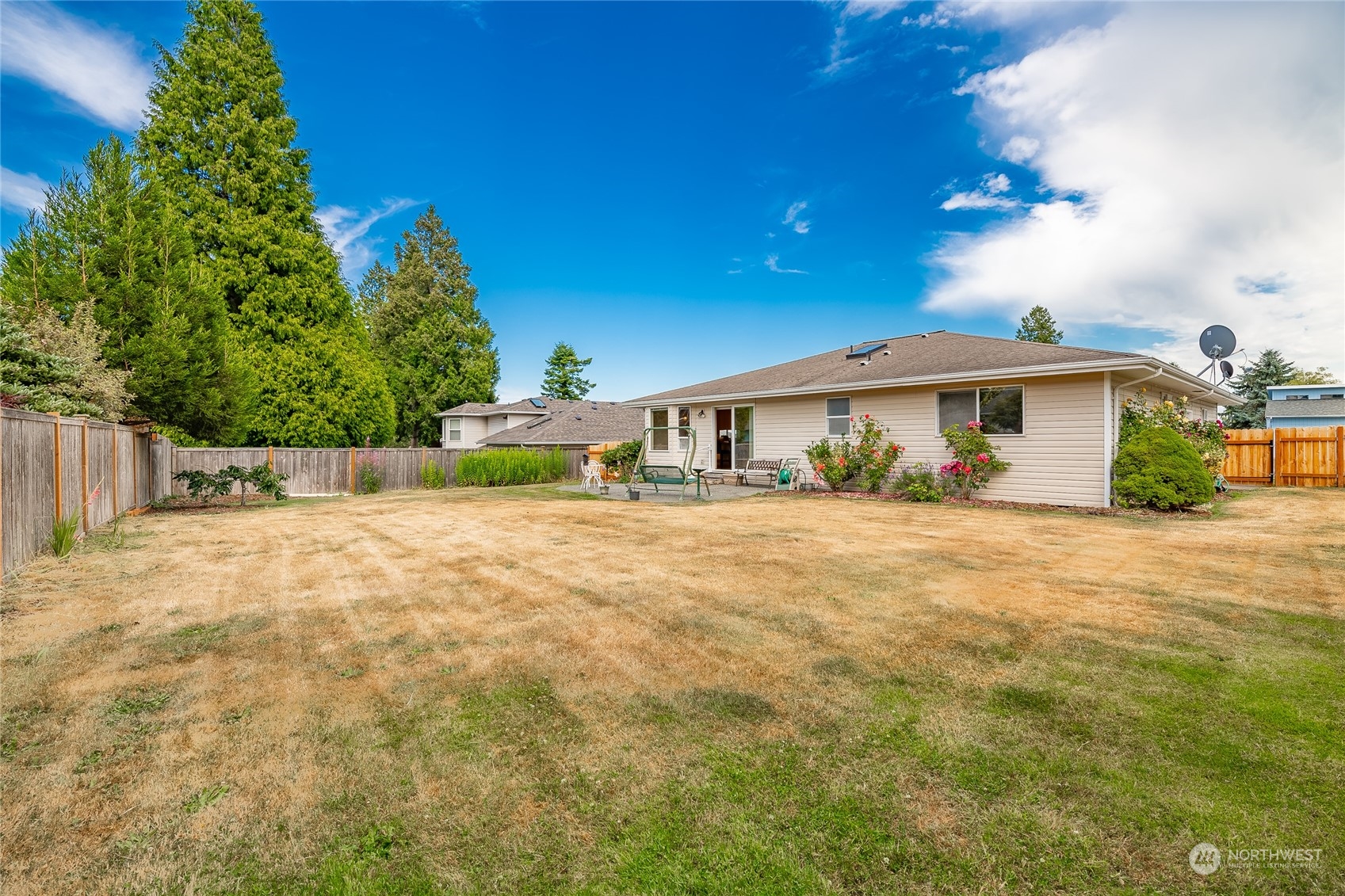 8087 Kispiox Road Blaine, WA 98230 - Photo 31 of 37 a front view of a house with a yard
