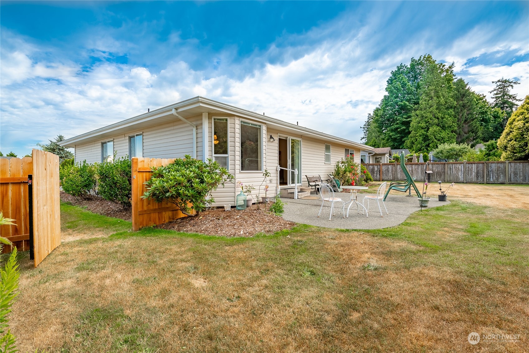 8087 Kispiox Road Blaine, WA 98230 - Photo 36 of 37 a view of a house with backyard and sitting area