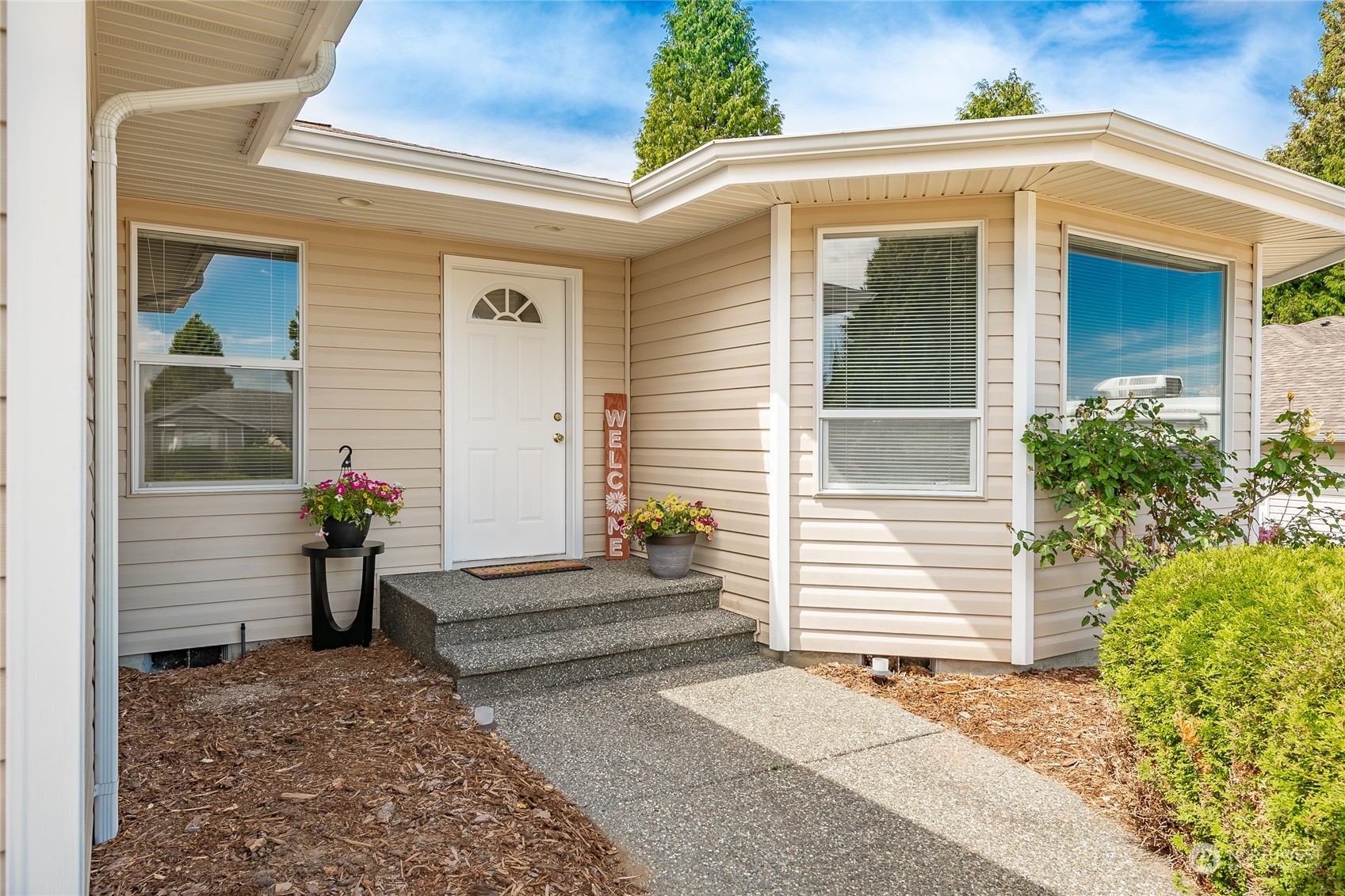 8087 Kispiox Road Blaine, WA 98230 - Photo 4 of 37 a view of a house with potted plants