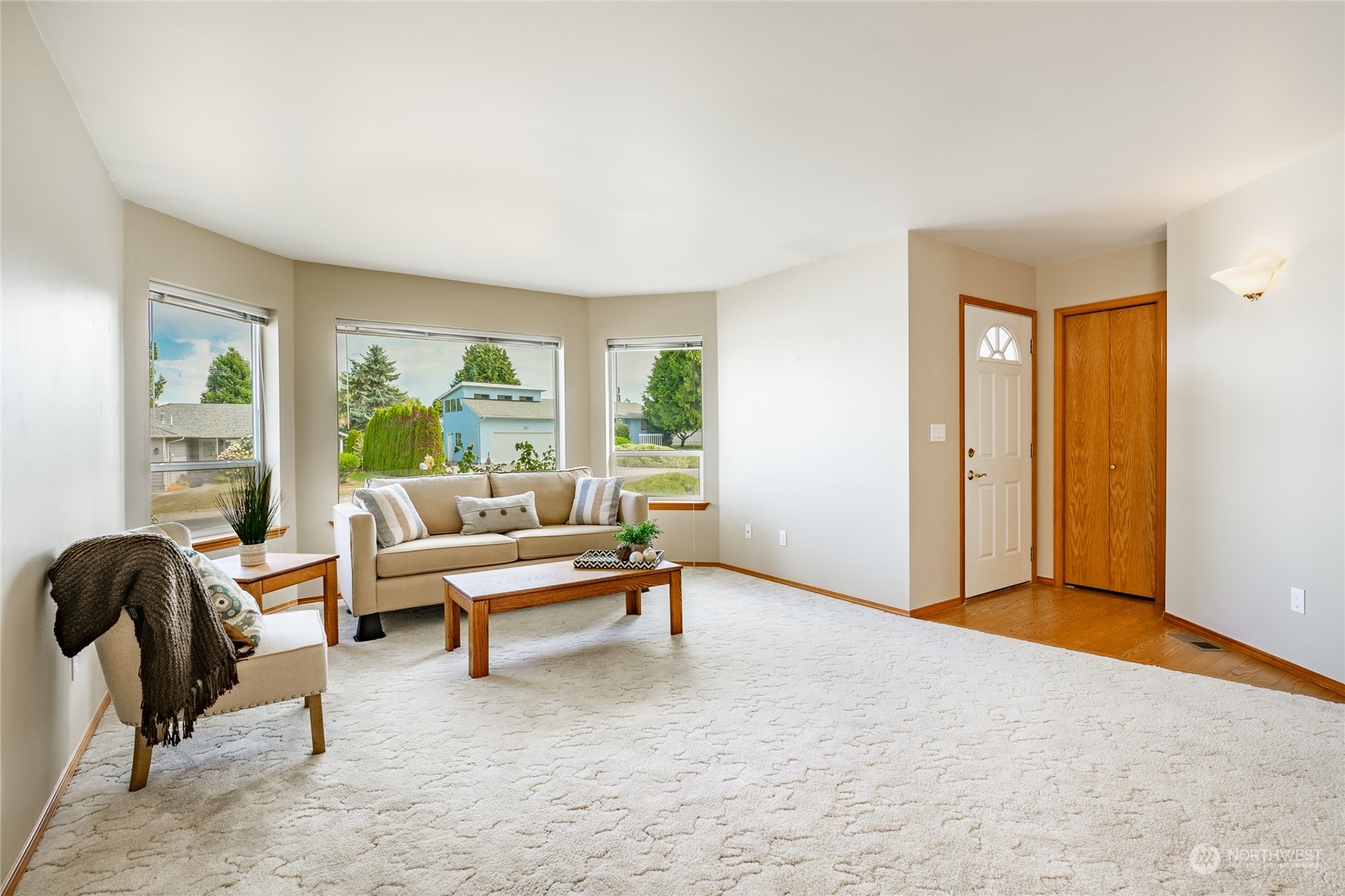8087 Kispiox Road Blaine, WA 98230 - Photo 7 of 37 a living room with furniture and large windows