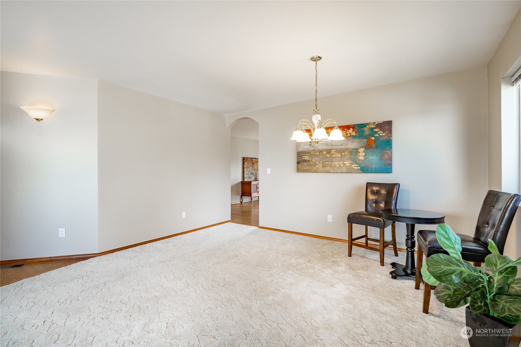 8087 Kispiox Road Blaine, WA 98230 - Photo 10 of 37 a view of a dining room with furniture window and wooden floor