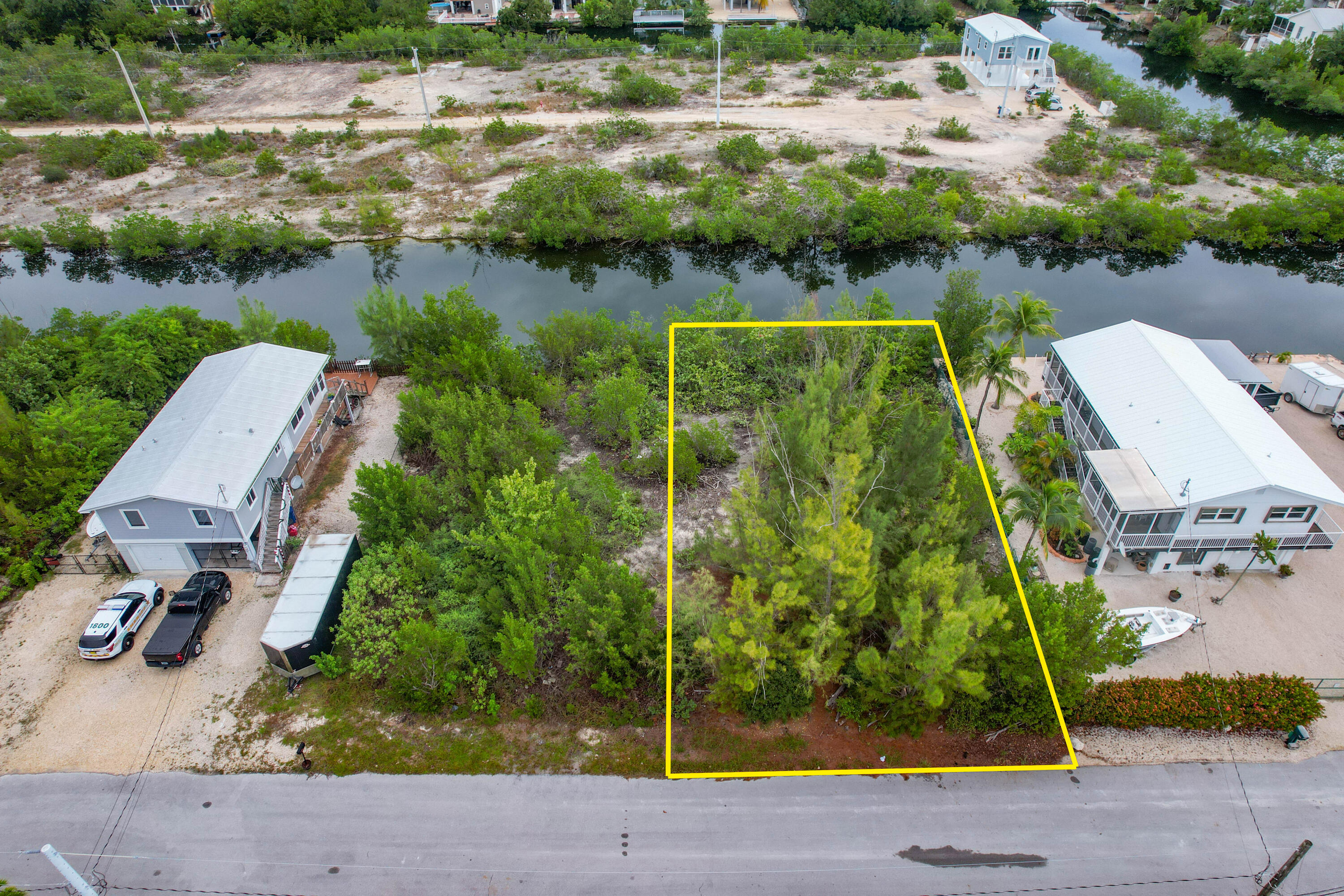 an aerial view of house with yard
