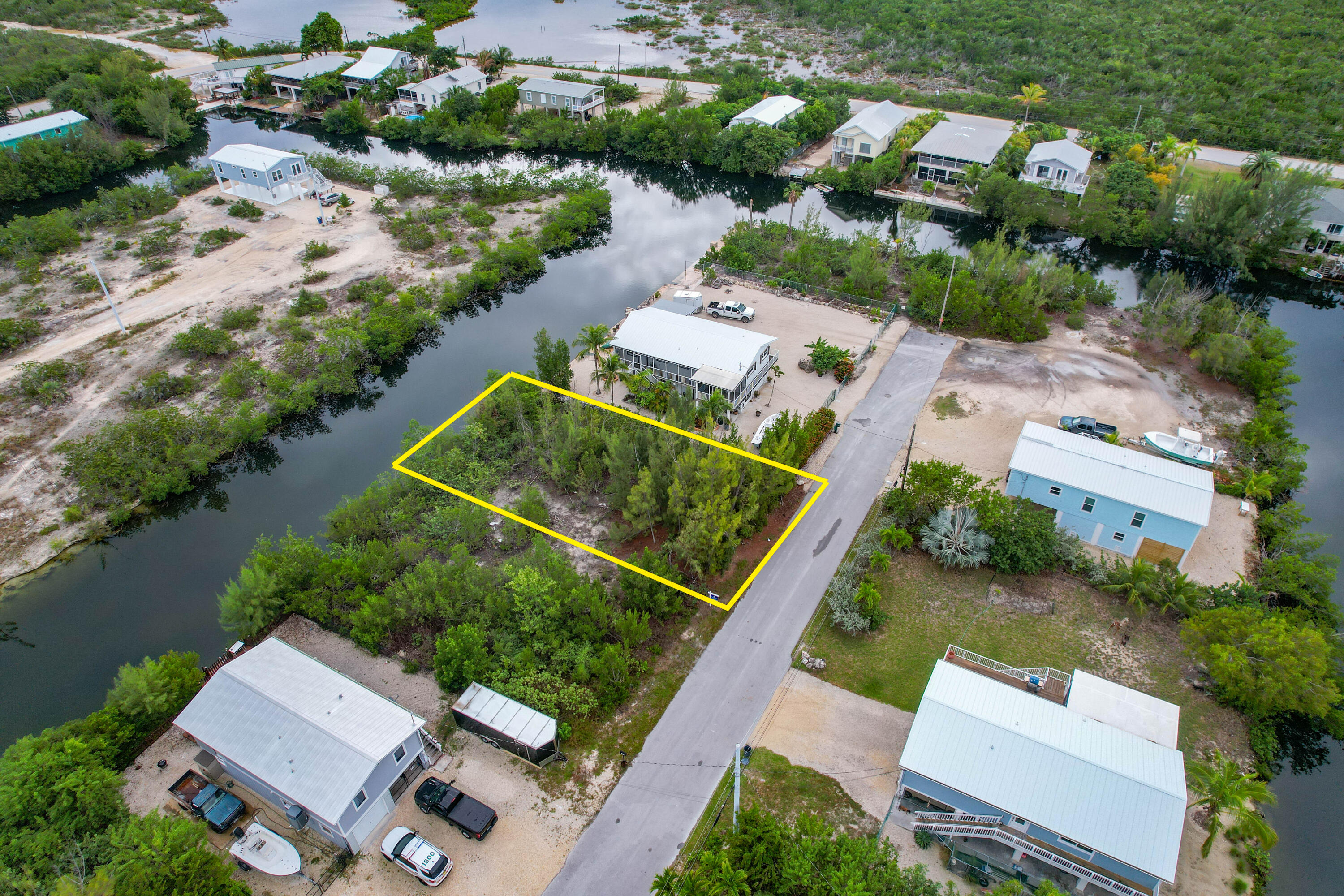 231 Pelican Lane Big Pine Key, FL 33043 - Photo 5 of 7 an aerial view of a house with a lake view