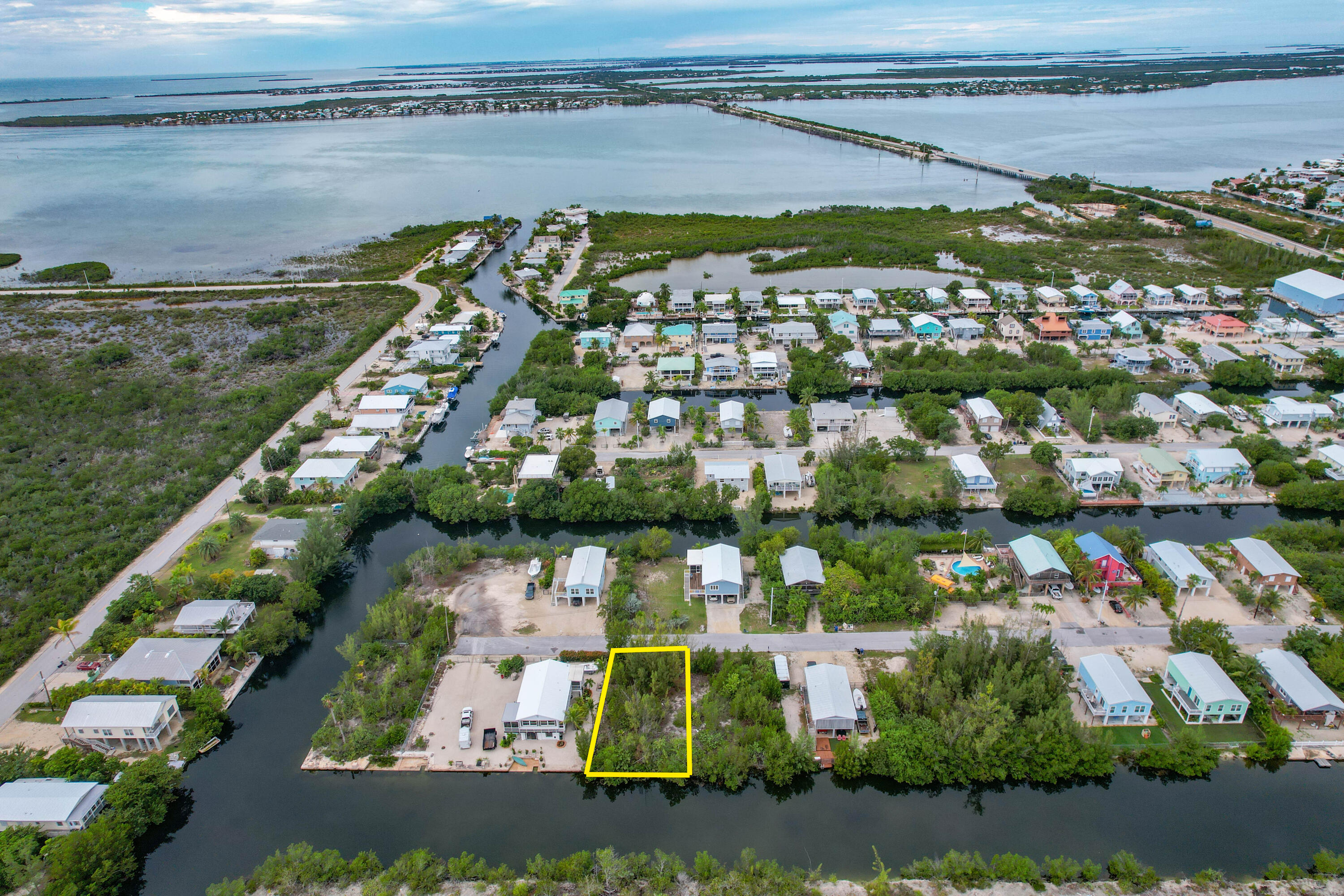 231 Pelican Lane Big Pine Key, FL 33043 - Photo 6 of 7 an aerial view of residential houses with outdoor space and lake view