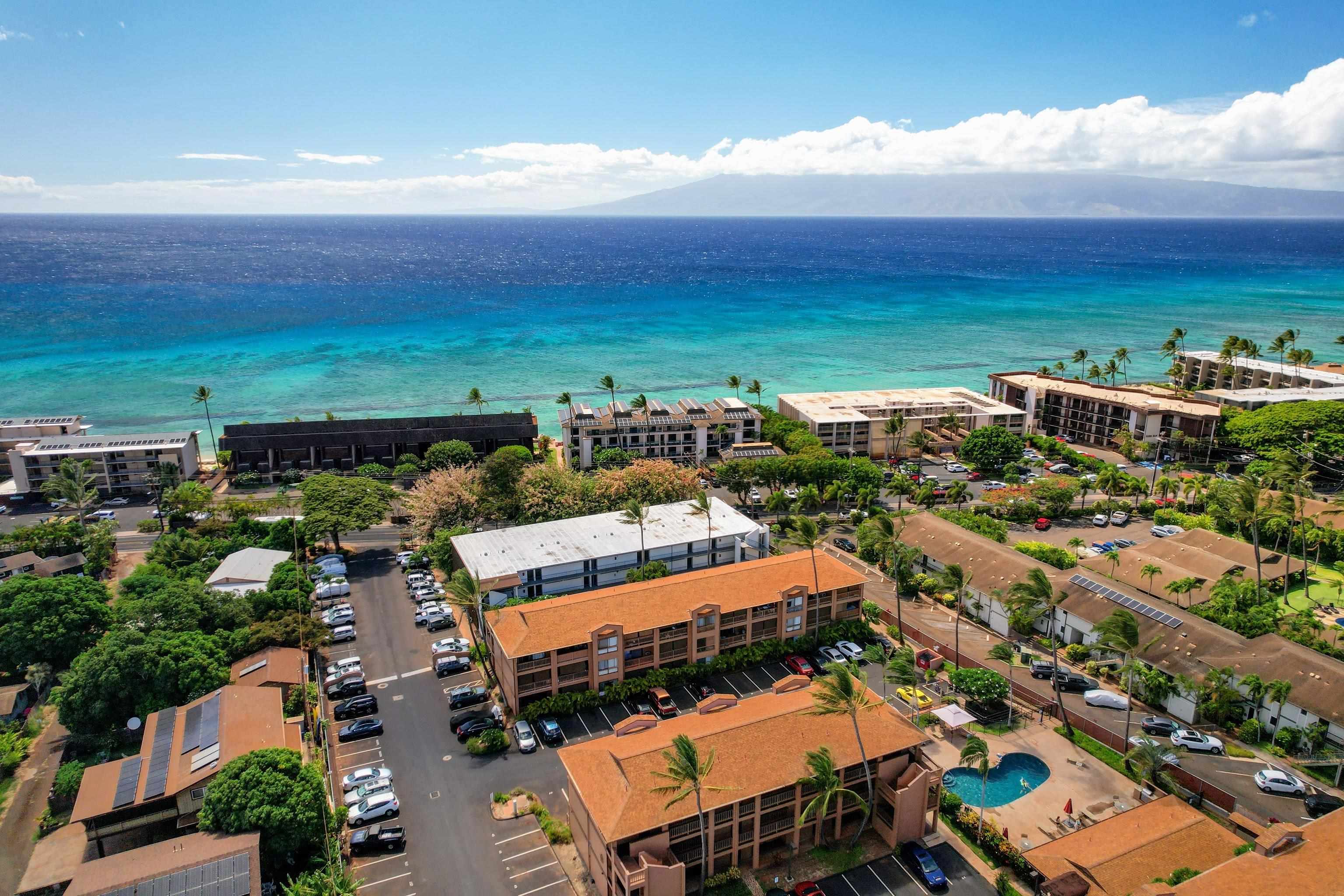 3740 Lower Honoapiilani Road, Unit C102 Lahaina, HI 96761 - Photo 21 of 50 an aerial view of multiple house