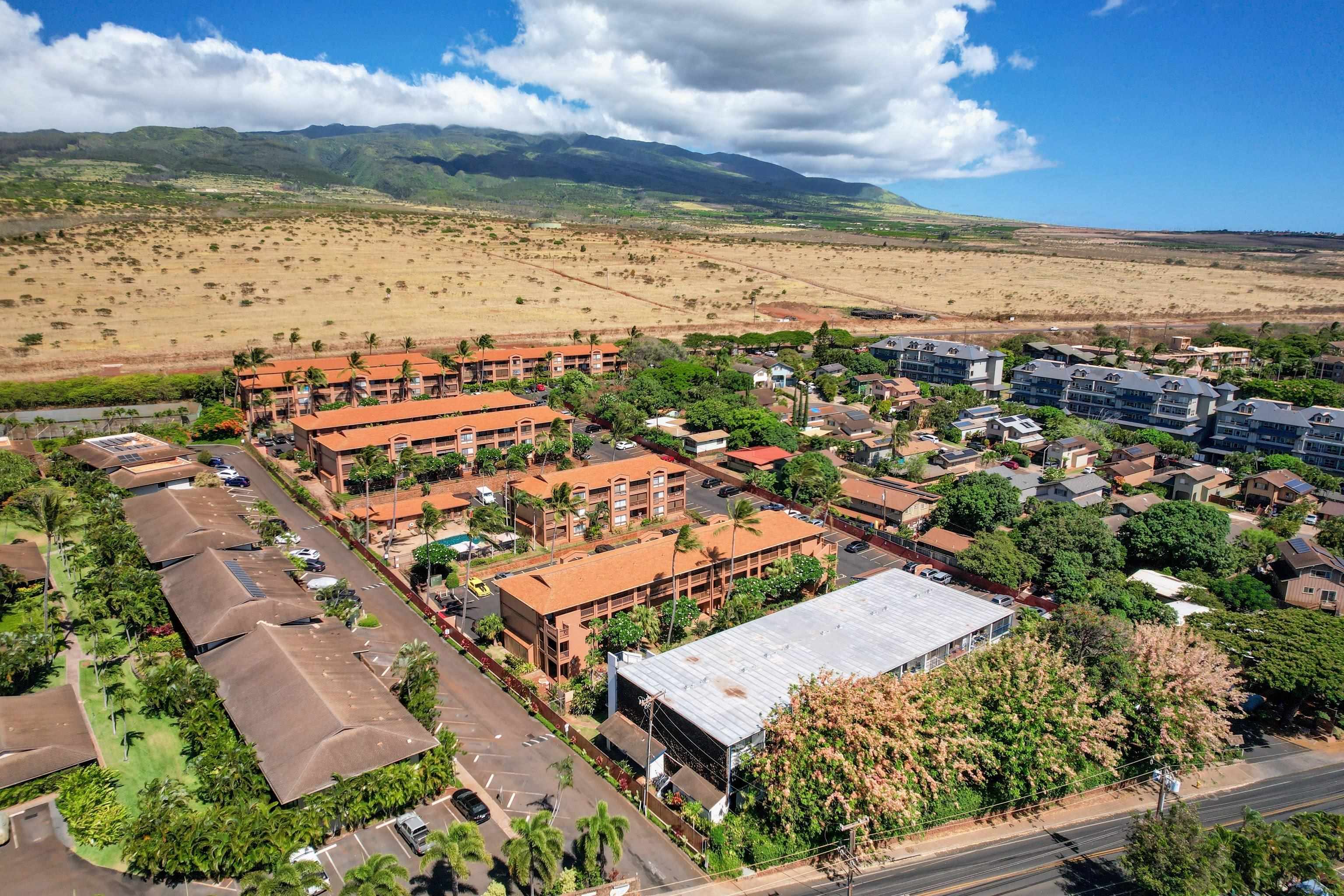 3740 Lower Honoapiilani Road, Unit C102 Lahaina, HI 96761 - Photo 25 of 50 an aerial view of residential building and lake