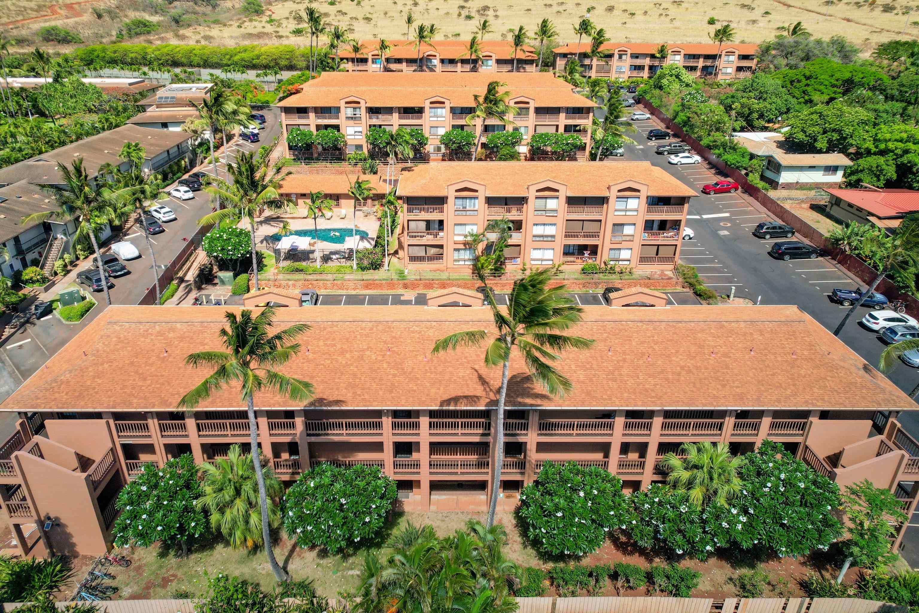 3740 Lower Honoapiilani Road, Unit C102 Lahaina, HI 96761 - Photo 26 of 50 an aerial view of multiple houses