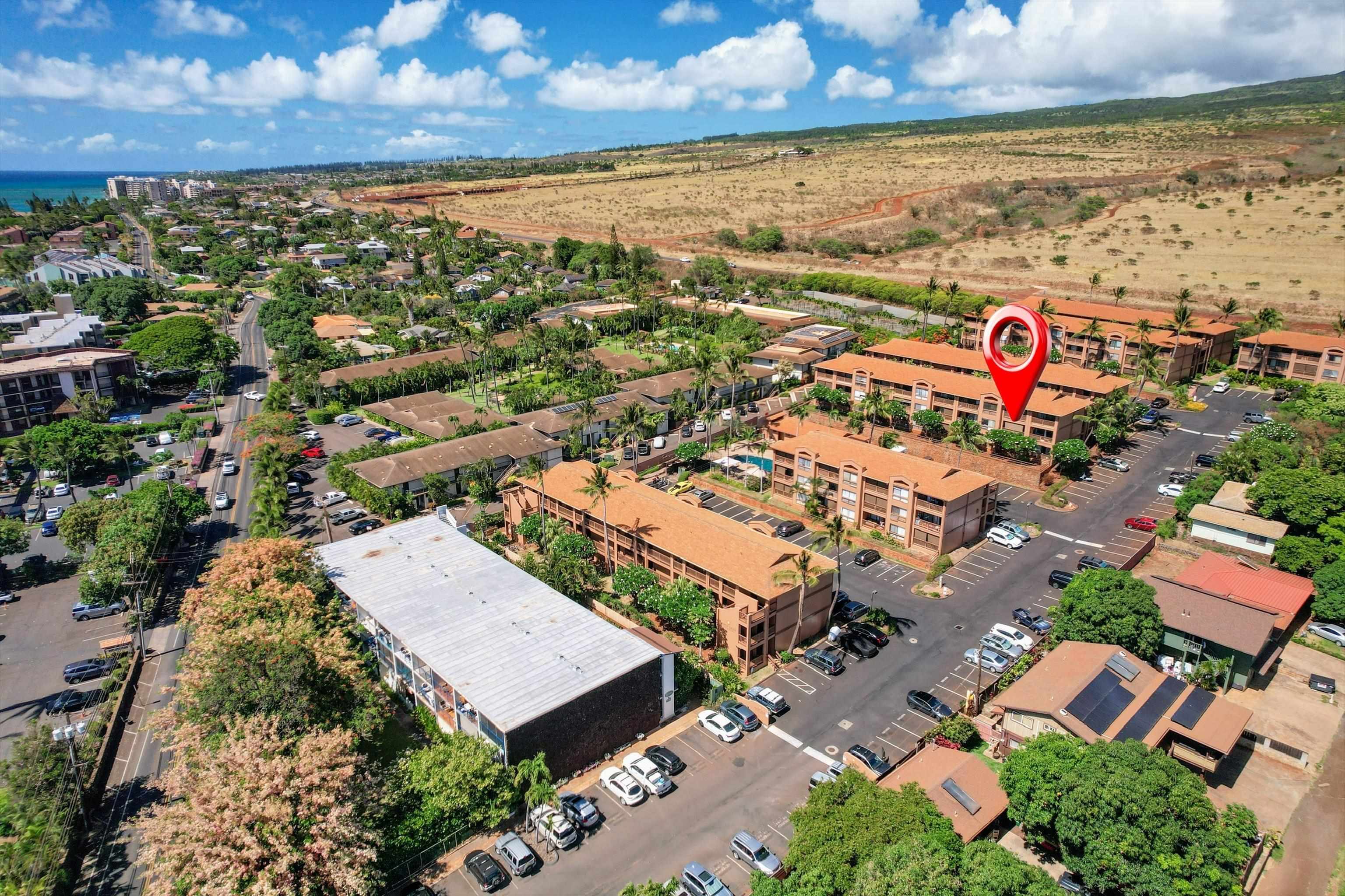 3740 Lower Honoapiilani Road, Unit C102 Lahaina, HI 96761 - Photo 44 of 50 an aerial view of residential building and lake