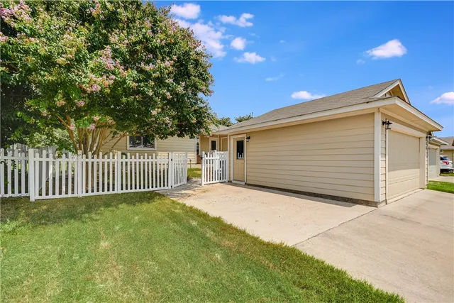 a porch with a small yard