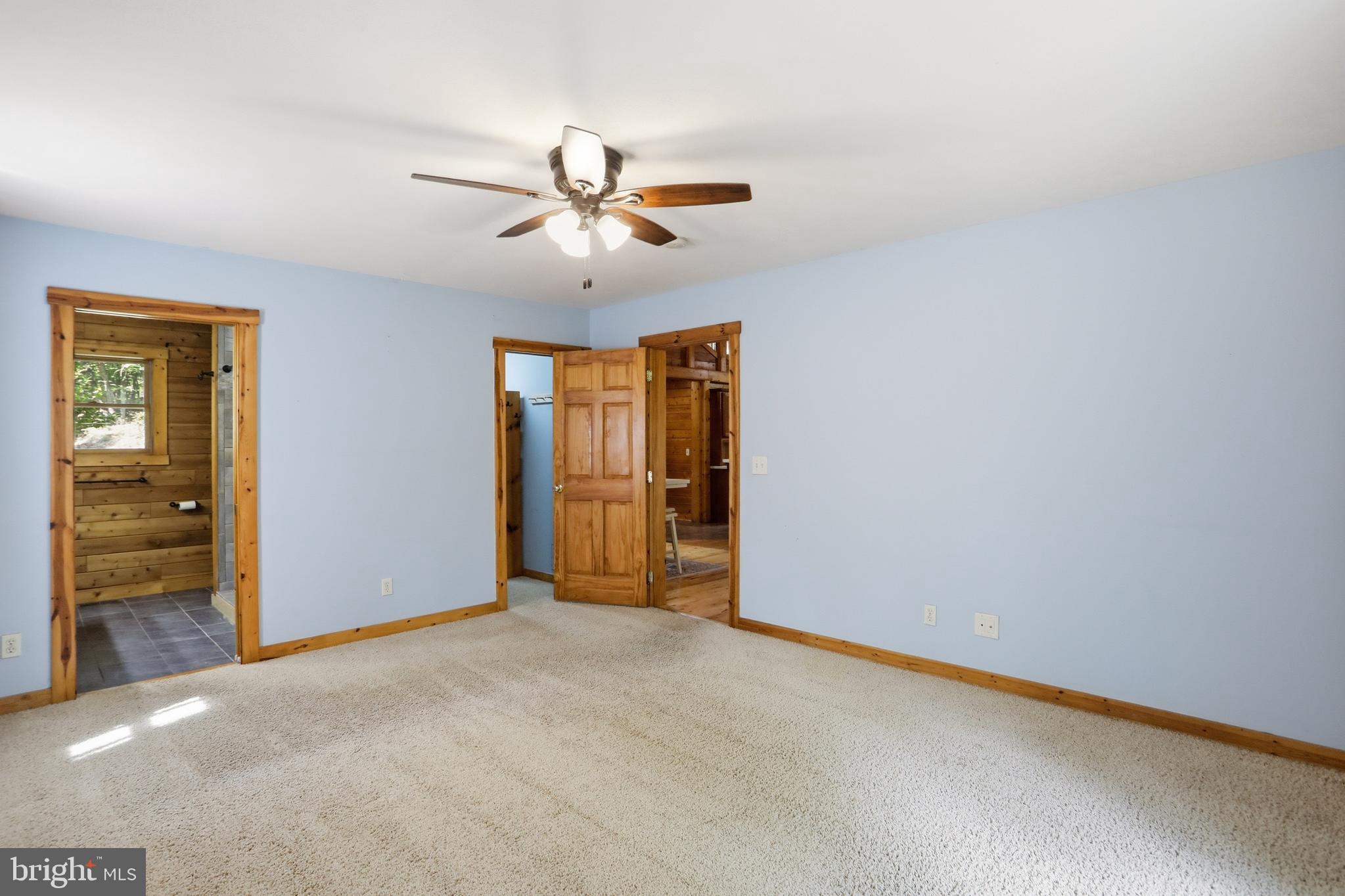 1400 Core Road Romney, WV 26757 - Photo 16 of 73 an empty room with closet and a ceiling fan