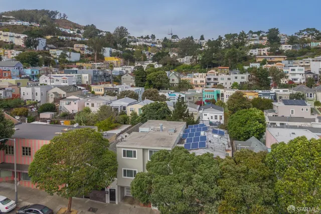 an aerial view of multiple house