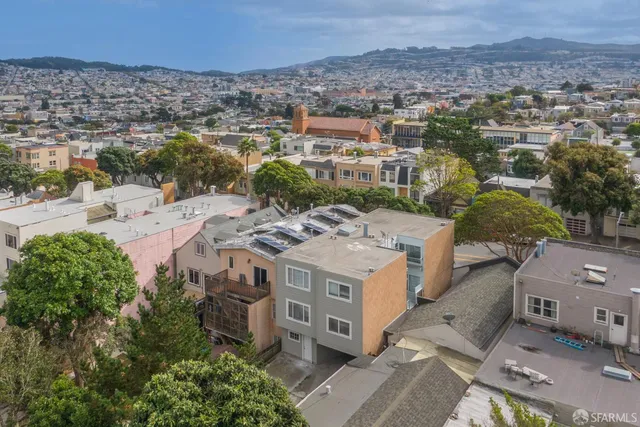 an aerial view of a house with a outdoor space