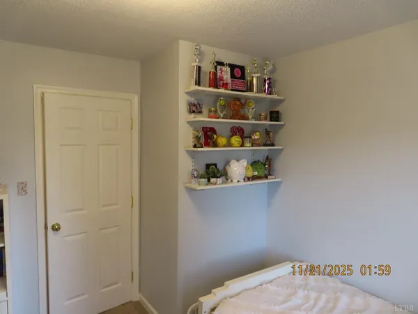 a room with a book shelf