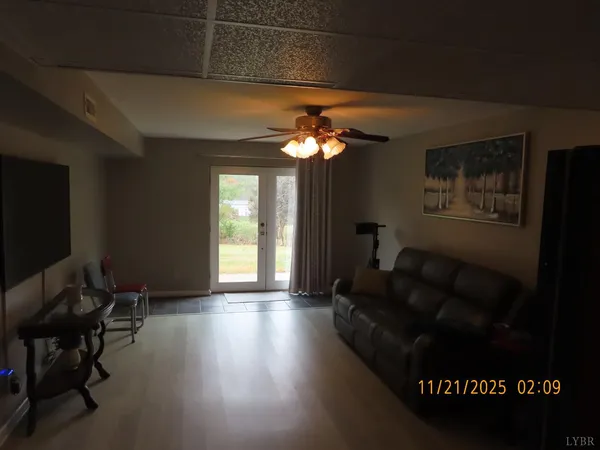 a bathroom with a toilet a sink and shower