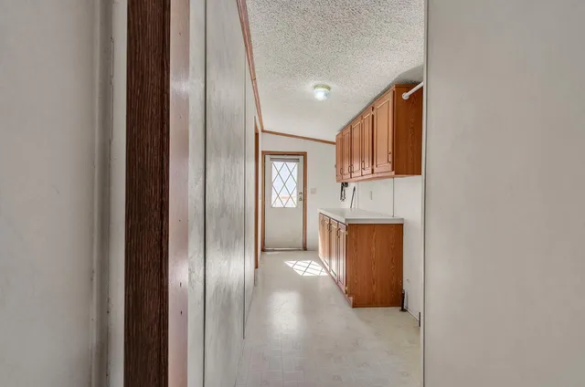 a bathroom with a tub and a shower