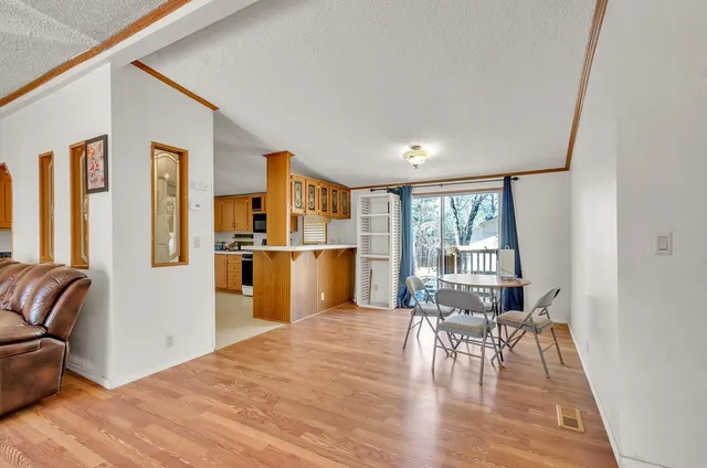 a view of workspace with wooden floor and chair