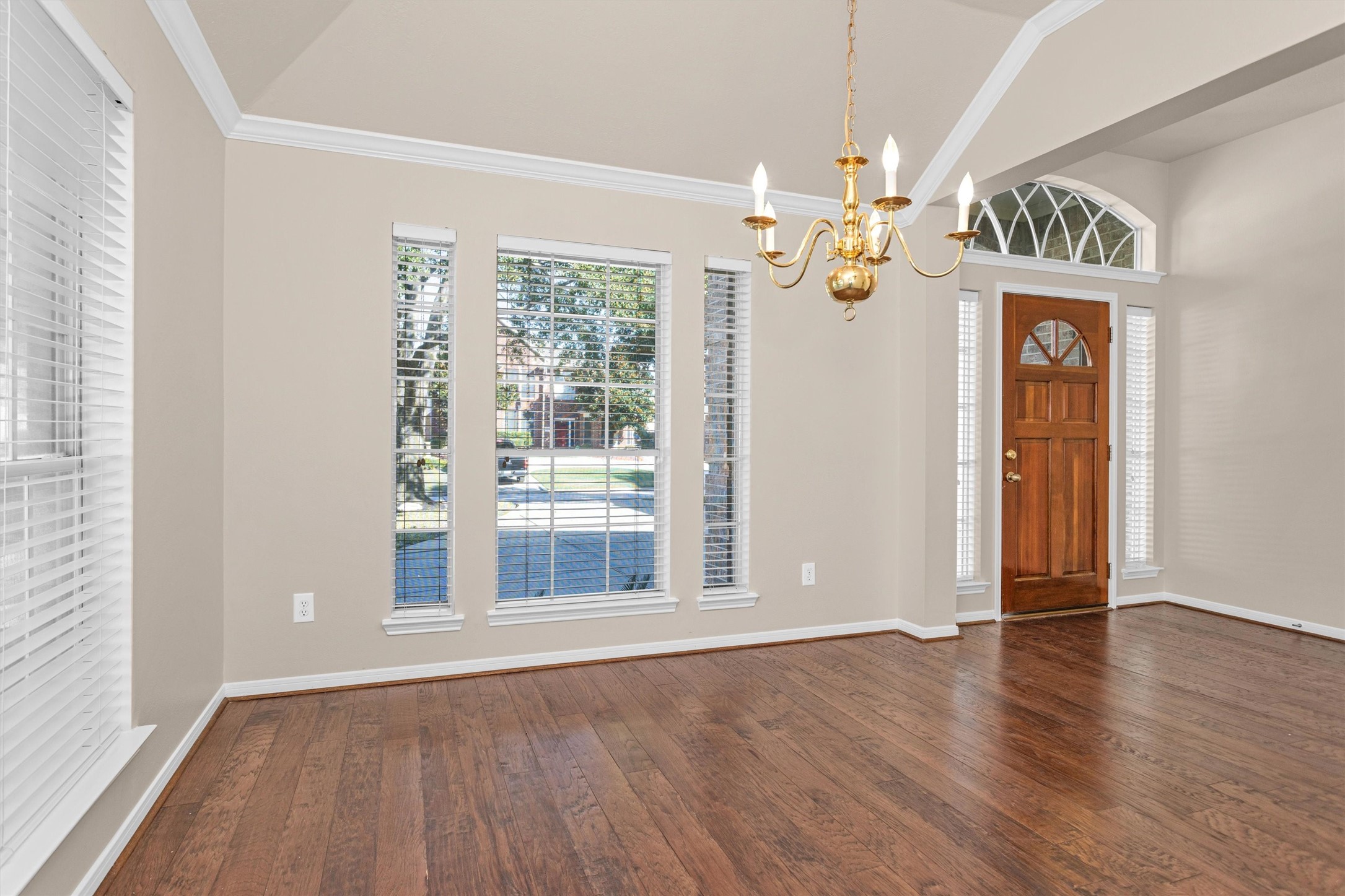2615 Honeysuckle Walk Spring, TX 77388 - Photo 9 of 39 wooden floor in an empty room with a window