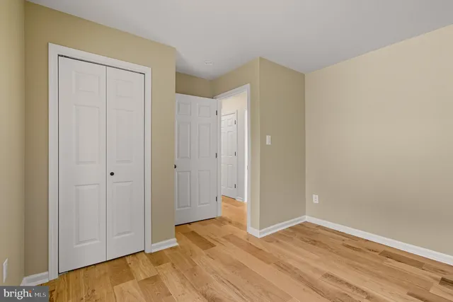 a view of a room with a large window