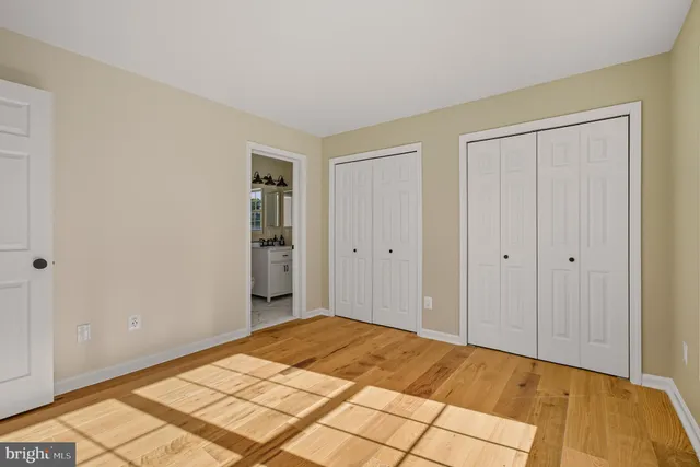 a view of empty room with windows