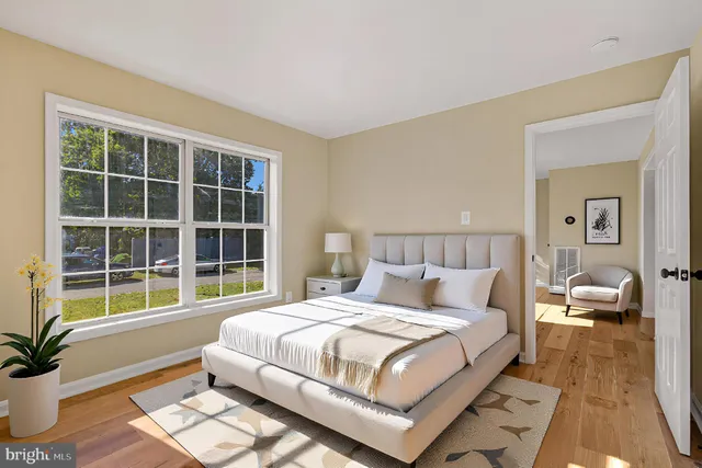 a view of balcony with wooden floor and fence
