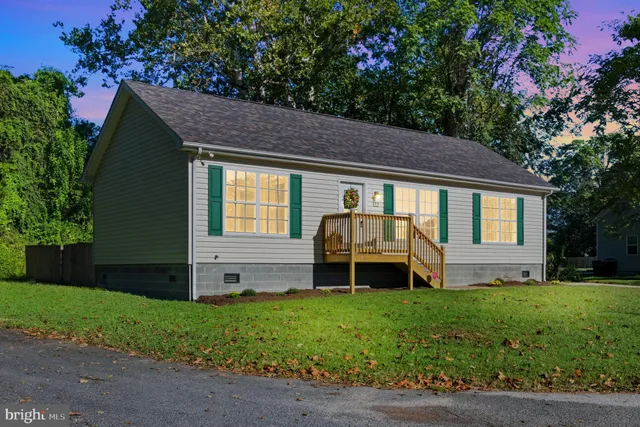 a house view with a garden space