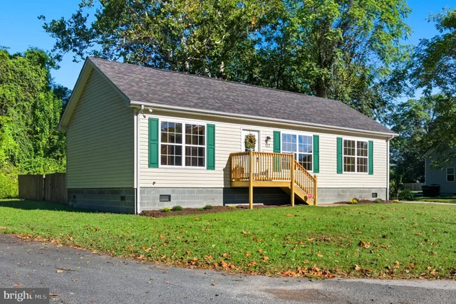 a house view with a garden space