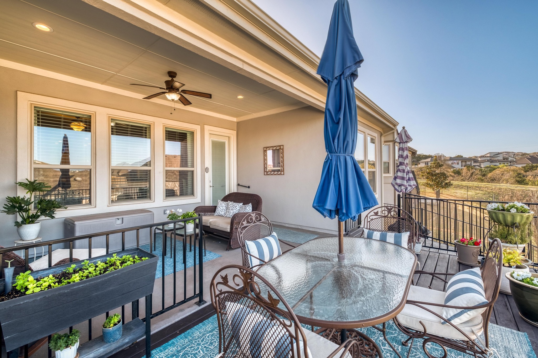 3204 Venezia View Leander, TX 78641 - Photo 25 of 28 Terrace with outdoor living space, outdoor dining area, and ceiling fan