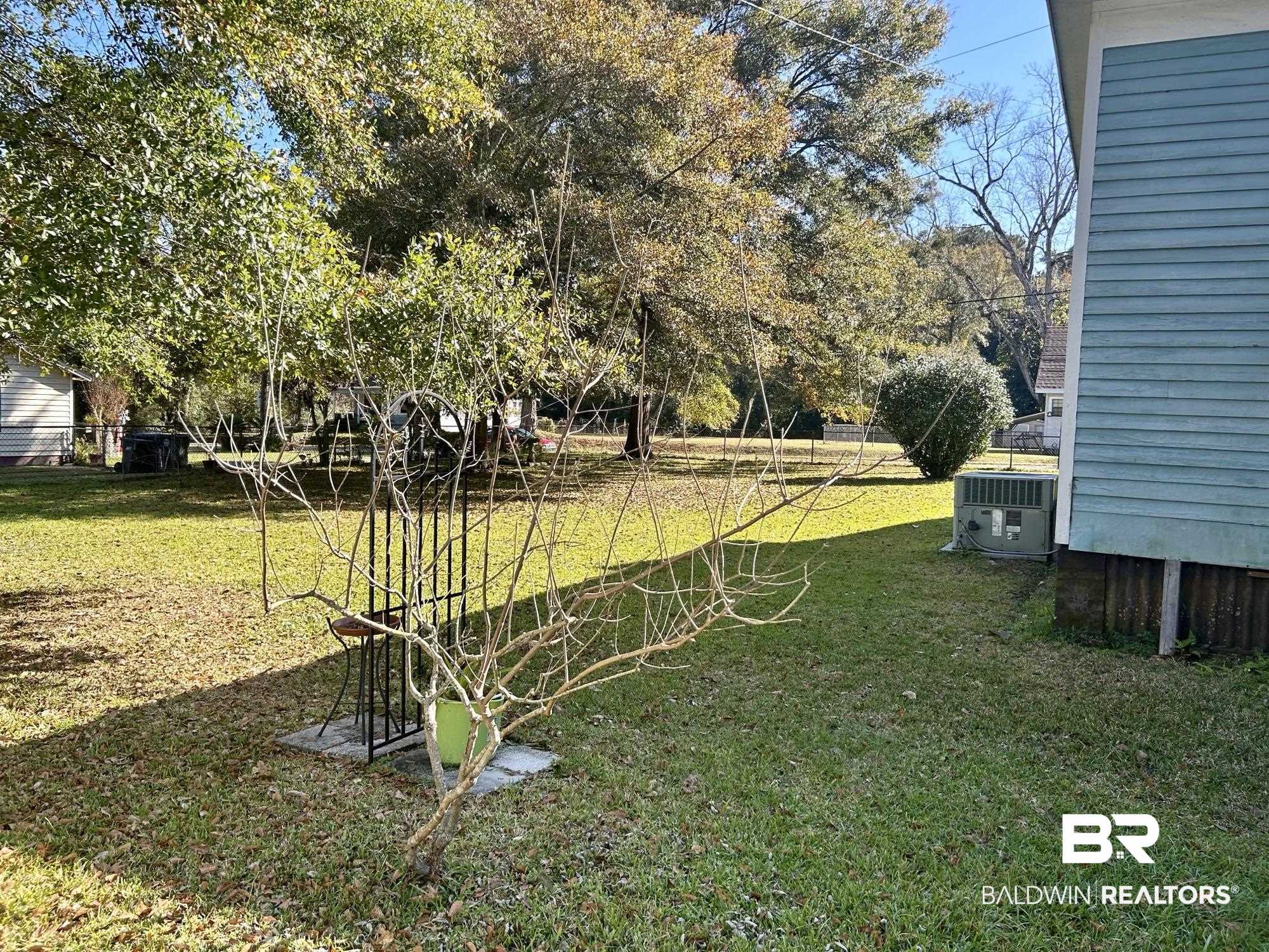 405 North Wasson Avenue Mobile, AL 36612 - Photo 22 of 26 View of yard featuring central AC unit