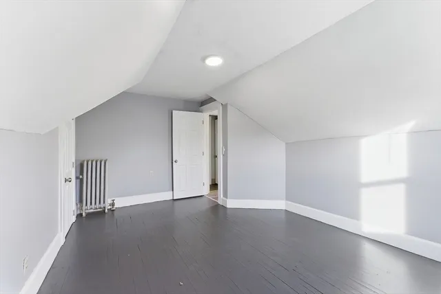 a view of a livingroom with wooden floor