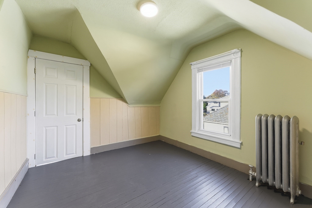 74-76 Maple Terrace West Springfield, MA 01089 - Photo 21 of 39 an empty room with windows
