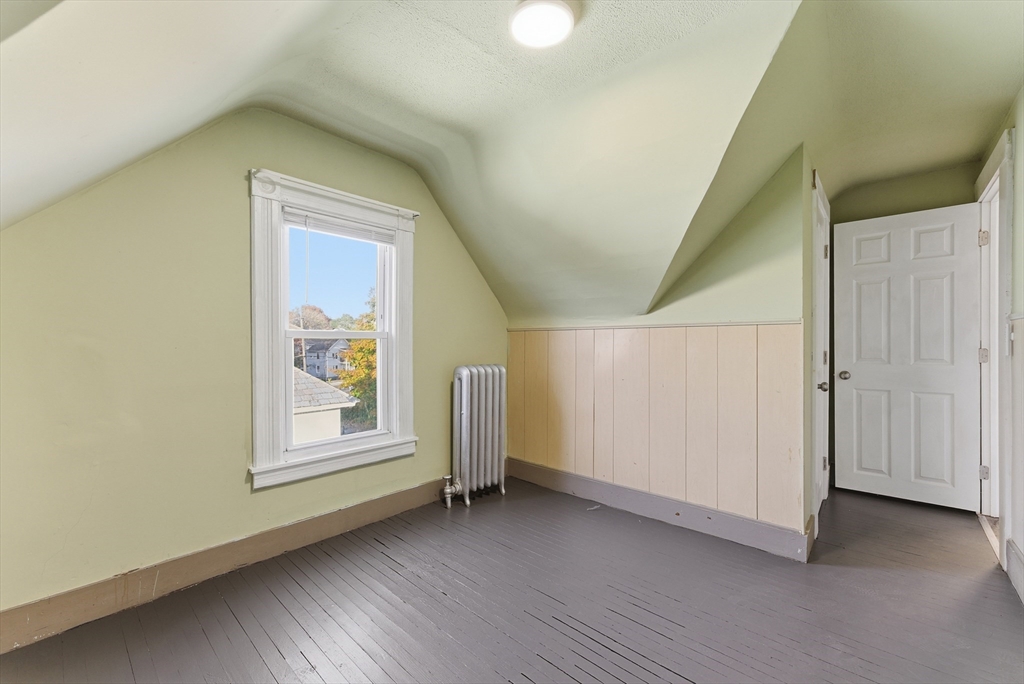 74-76 Maple Terrace West Springfield, MA 01089 - Photo 22 of 39 an empty room with windows