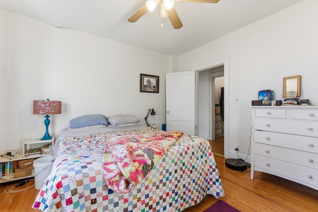 74-76 Maple Terrace West Springfield, MA 01089 - Photo 29 of 39 a bedroom with a bed and a dresser in it