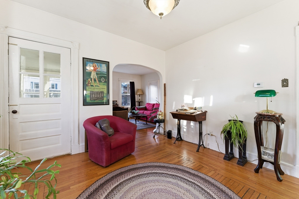 74-76 Maple Terrace West Springfield, MA 01089 - Photo 32 of 39 a living room with furniture flowerpot and wooden floor