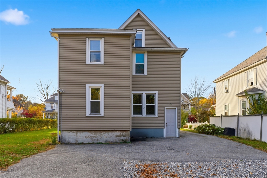 74-76 Maple Terrace West Springfield, MA 01089 - Photo 5 of 39 a front view of a house with garden