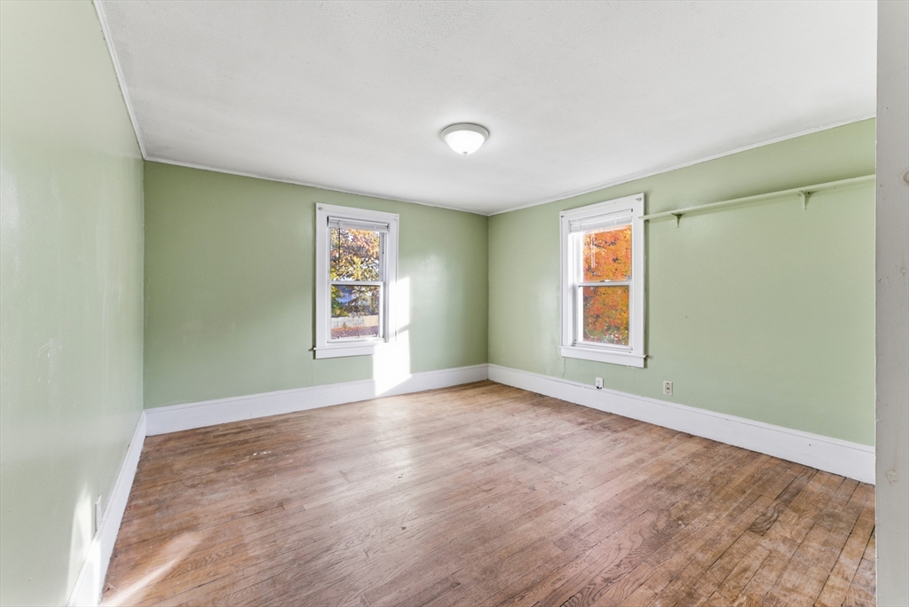 74-76 Maple Terrace West Springfield, MA 01089 - Photo 9 of 39 an empty room with windows