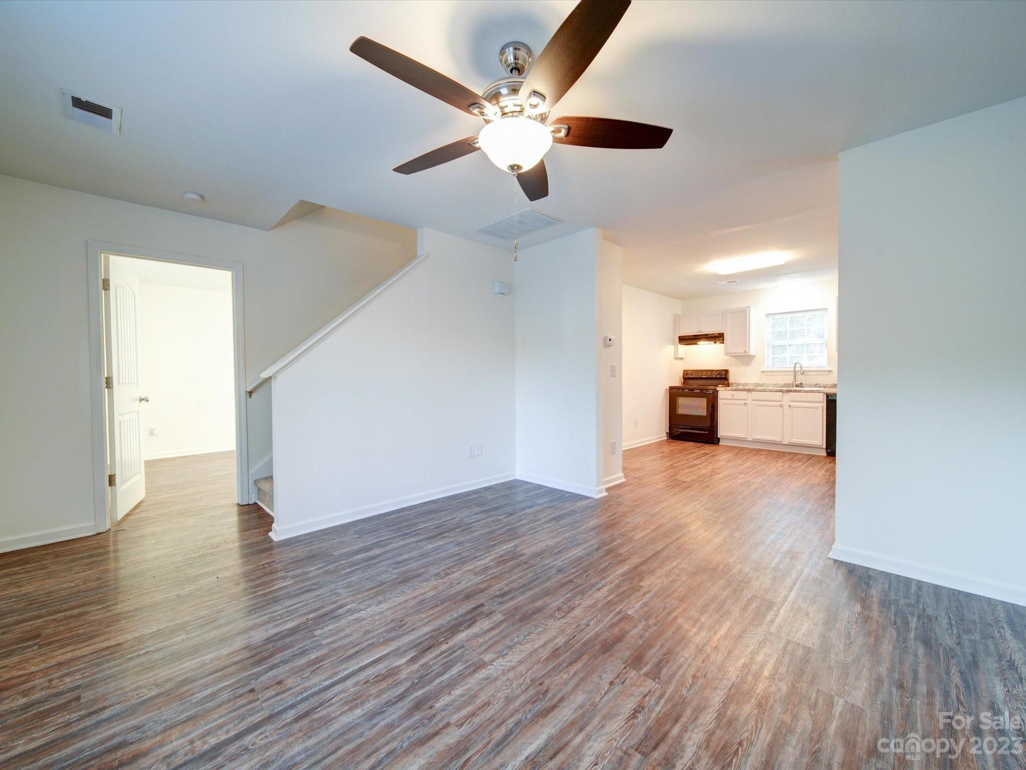 925 Key Street Charlotte, NC 28208 - Photo 11 of 41 a view of empty room with wooden floor