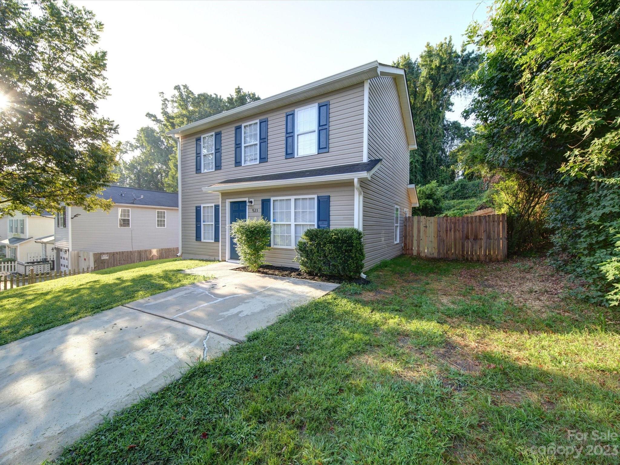 925 Key Street Charlotte, NC 28208 - Photo 2 of 41 a house view with a garden space
