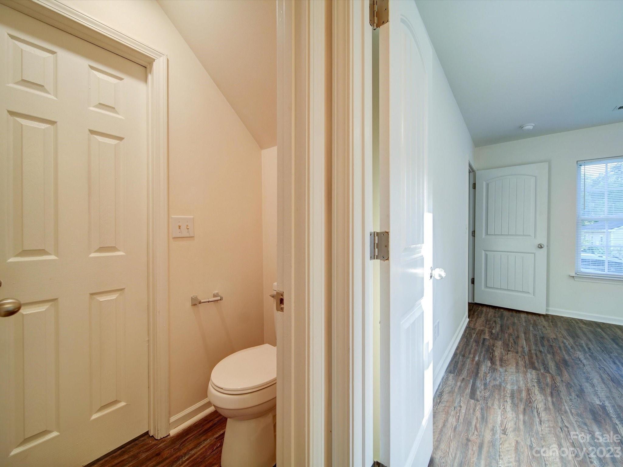 925 Key Street Charlotte, NC 28208 - Photo 22 of 41 a bathroom with a toilet and a shower