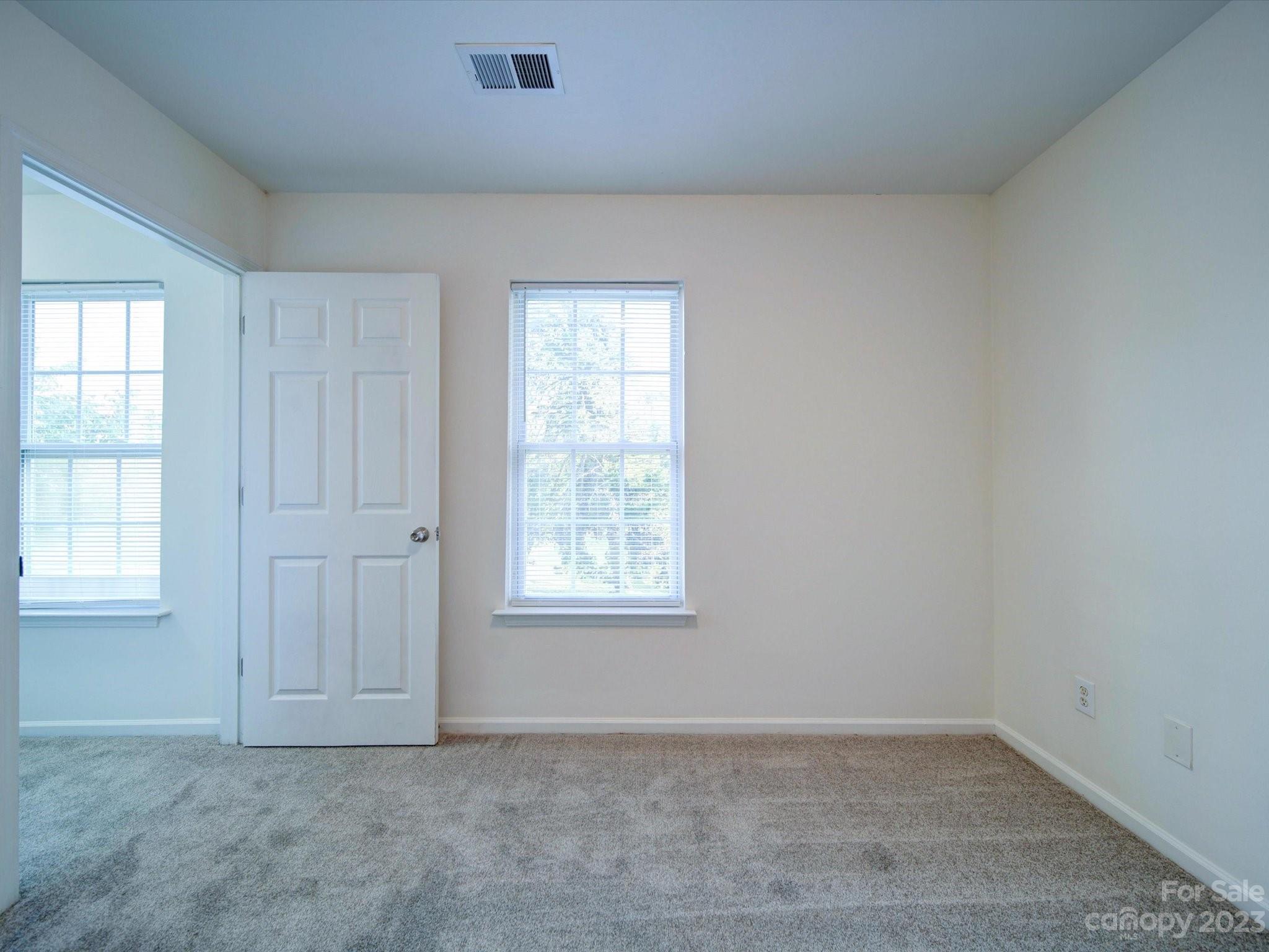 925 Key Street Charlotte, NC 28208 - Photo 25 of 41 an empty room with windows