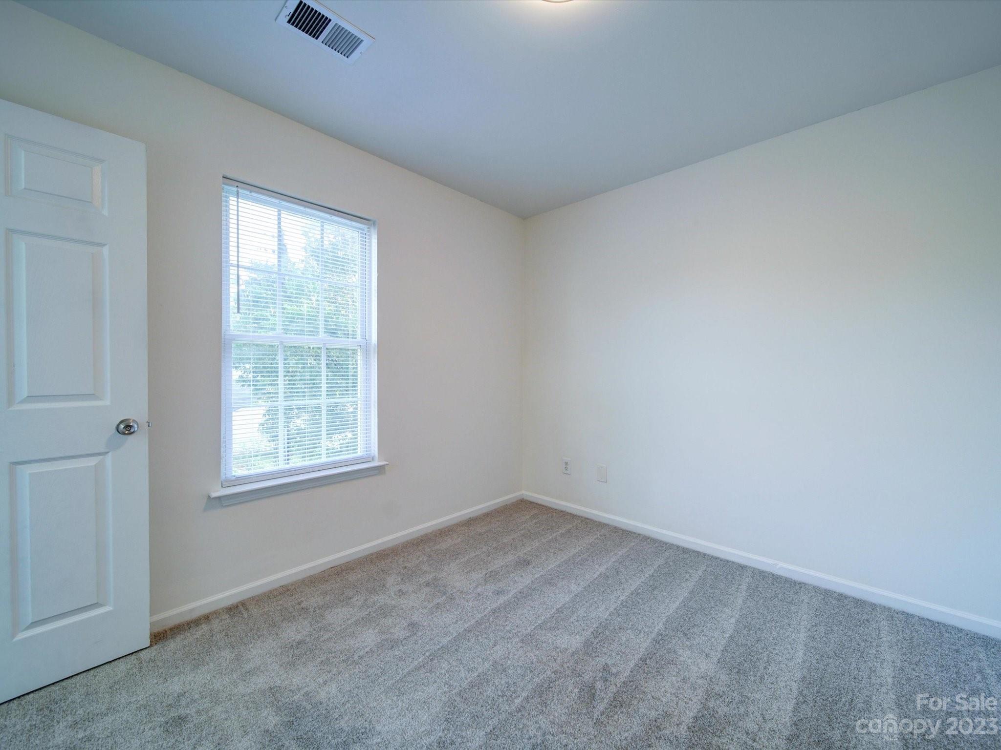 925 Key Street Charlotte, NC 28208 - Photo 26 of 41 an empty room with a window
