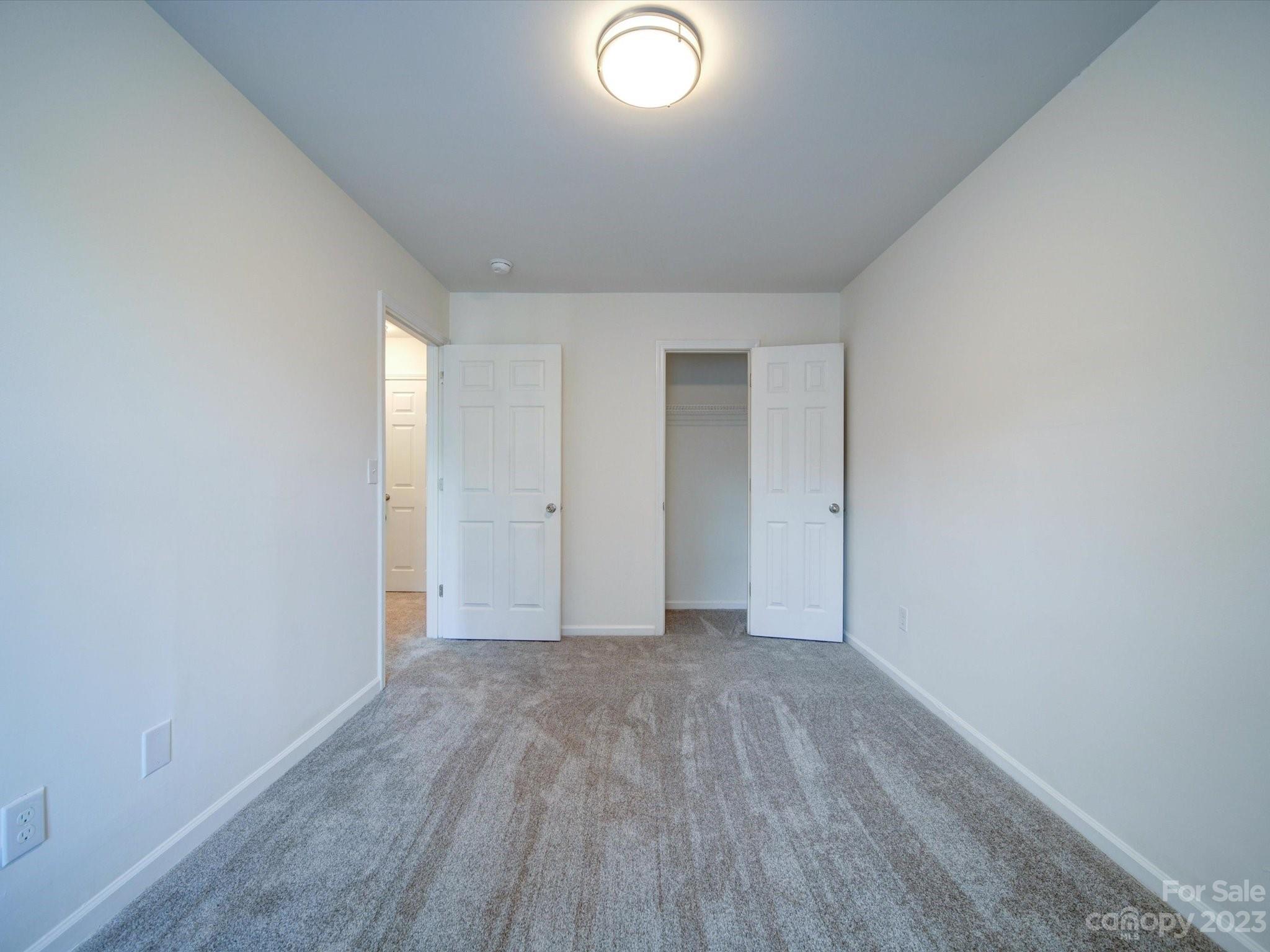 925 Key Street Charlotte, NC 28208 - Photo 28 of 41 a view of an empty room and wooden floor