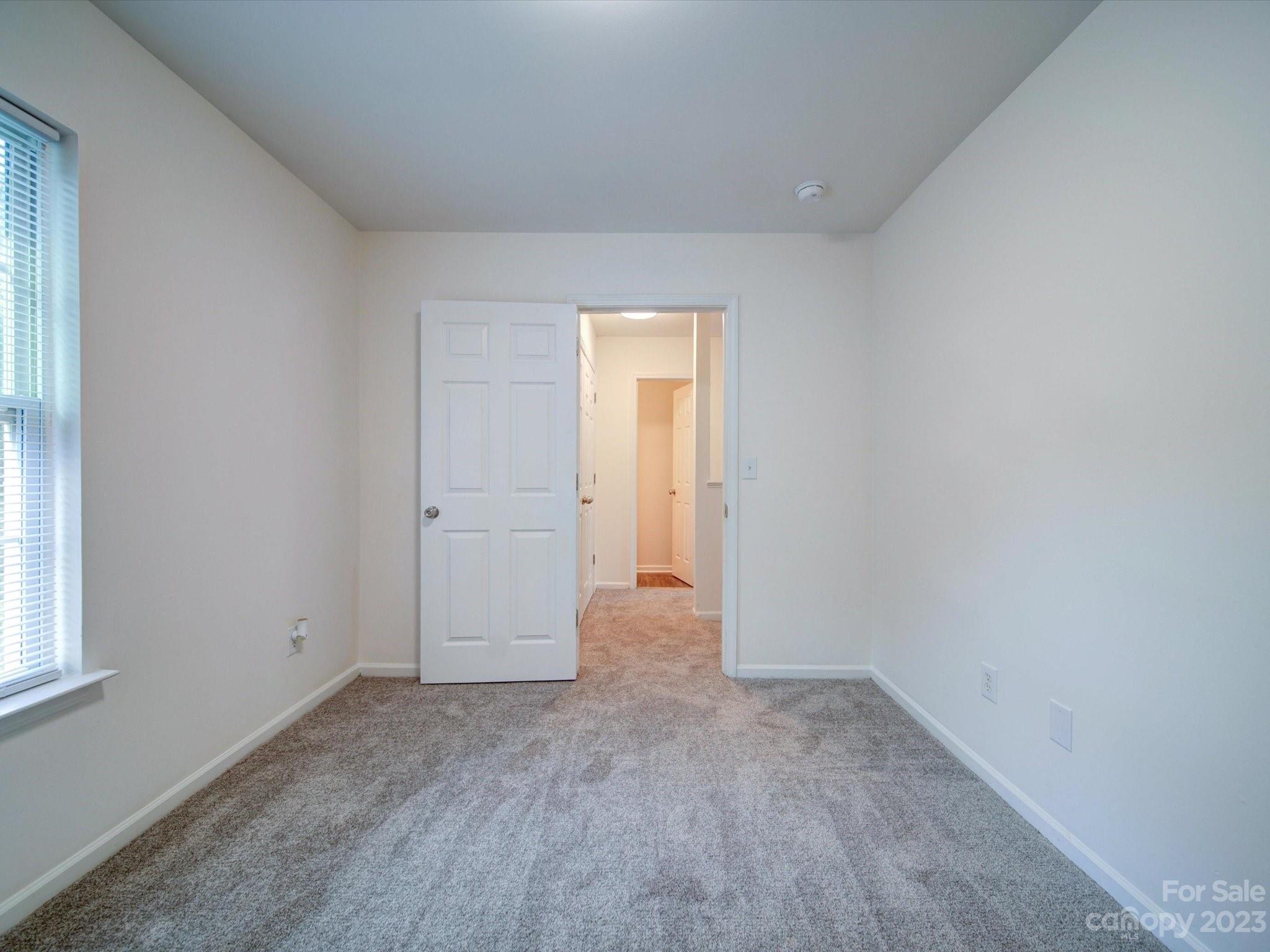 925 Key Street Charlotte, NC 28208 - Photo 41 of 41 an empty room with a window
