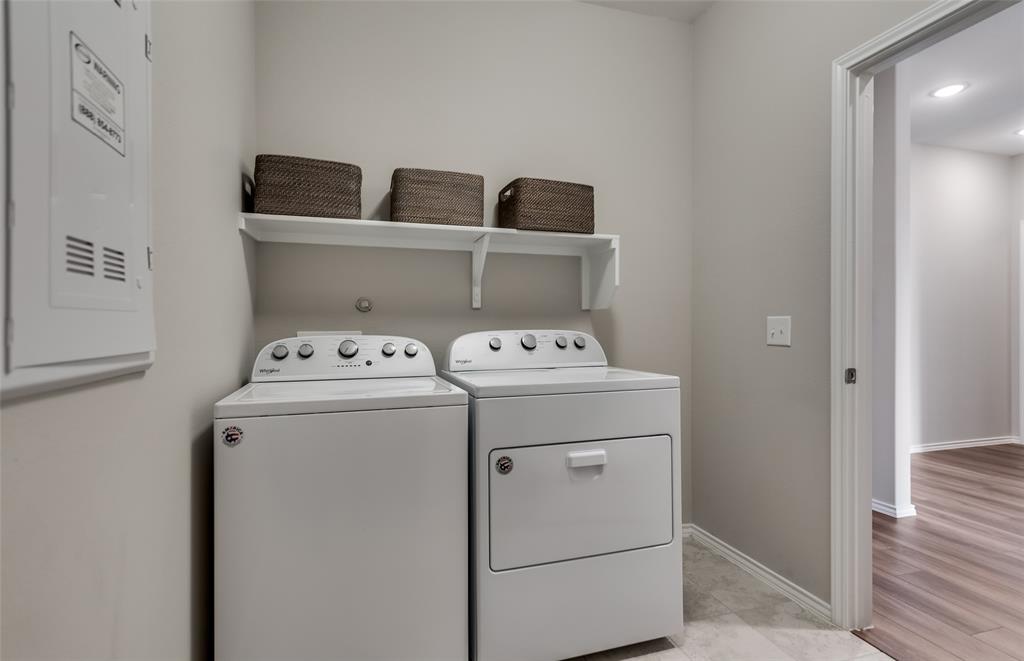 816 Shire Avenue Haslet, TX 76052 - Photo 13 of 23 a utility room with dryer and washer