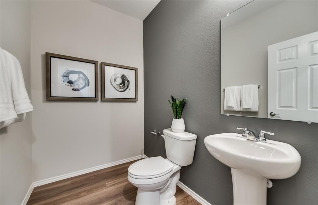 816 Shire Avenue Haslet, TX 76052 - Photo 20 of 23 a bathroom with a toilet sink and mirror