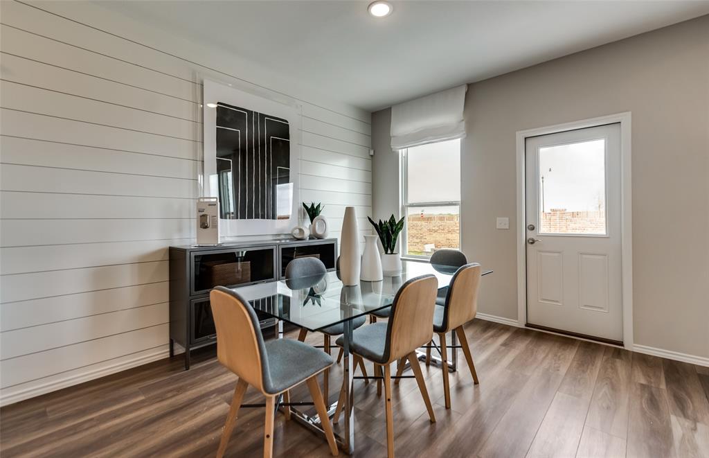 816 Shire Avenue Haslet, TX 76052 - Photo 5 of 23 a view of a dining room with furniture and wooden floor