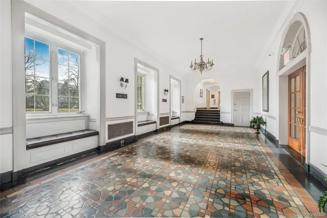a view of a livingroom with a staircase